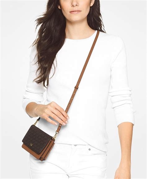 michael michael kors mott signature phone crossbody|Michael Kors Mott Phone Crossbody .